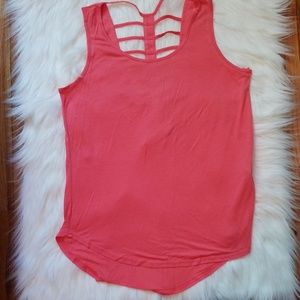 Coral top with cut out pattern